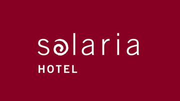 A stylish logo of the Solaria Hotel on a burgundy background. The modern font conveys an elegant and inviting feeling.